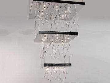 Illuminazione a cristallo di lusso del candeliere, candelieri dell'hotel con tre lampade di strato